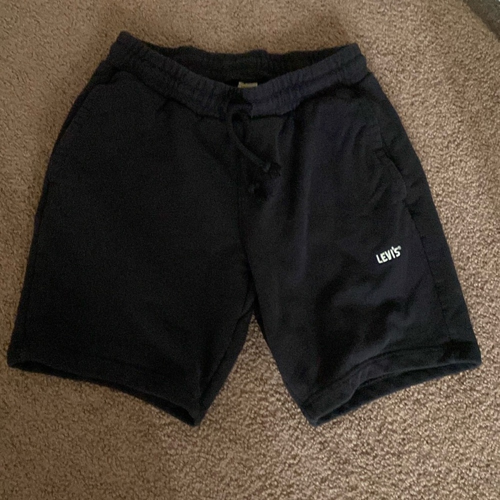 Levi’s black shorts size extra small in men’s, worn once to try on no damage.